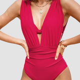Luxe | Costume modellante con profondo scollo a V