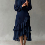 Elegante abito midi plissettato con volant