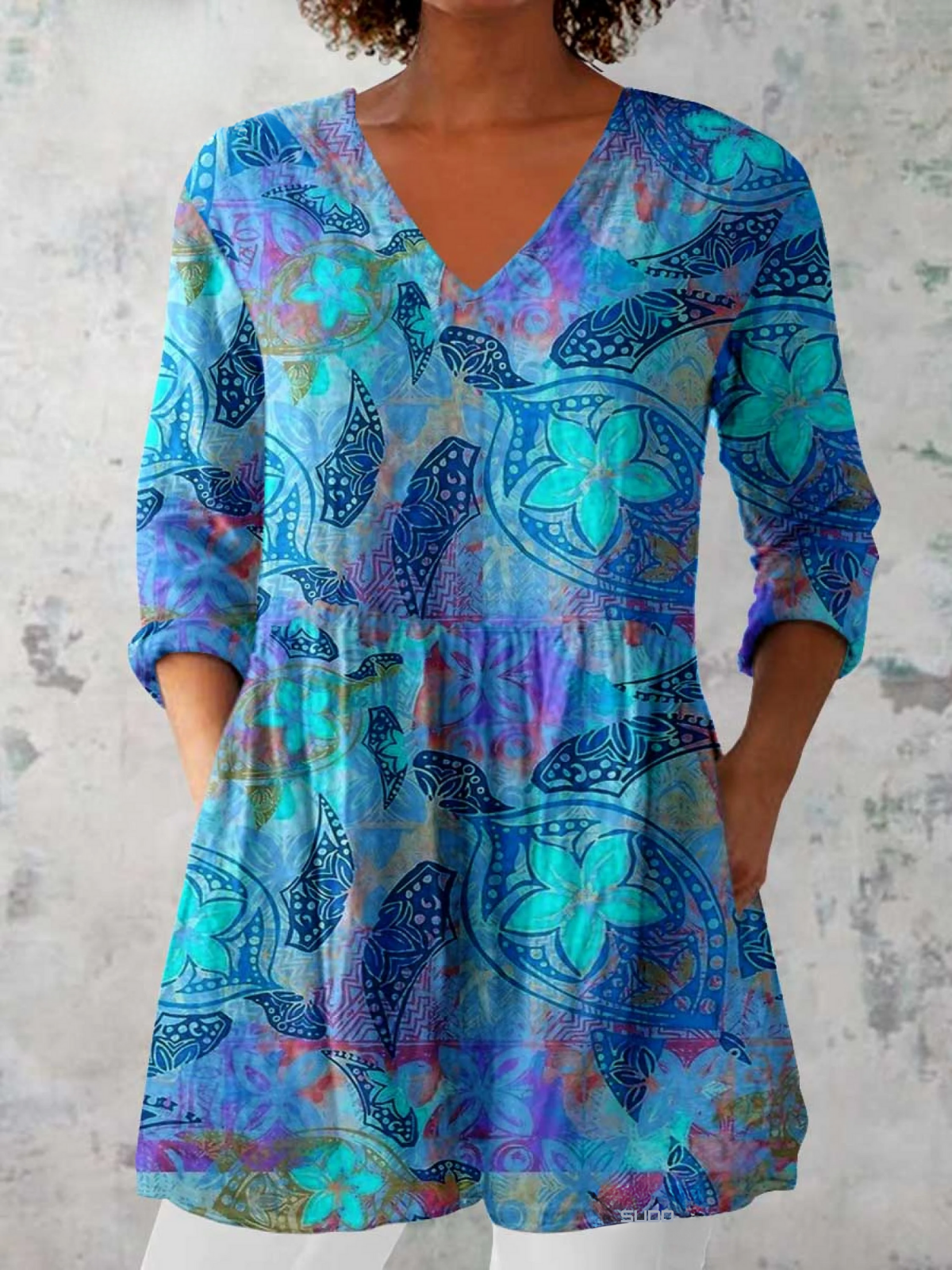 Blusa lunga con scollatura a V