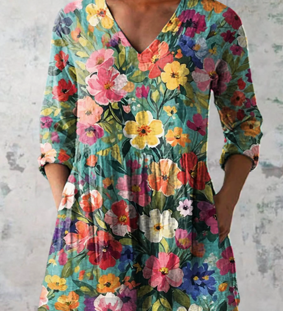 Blusa lunga con scollo a V