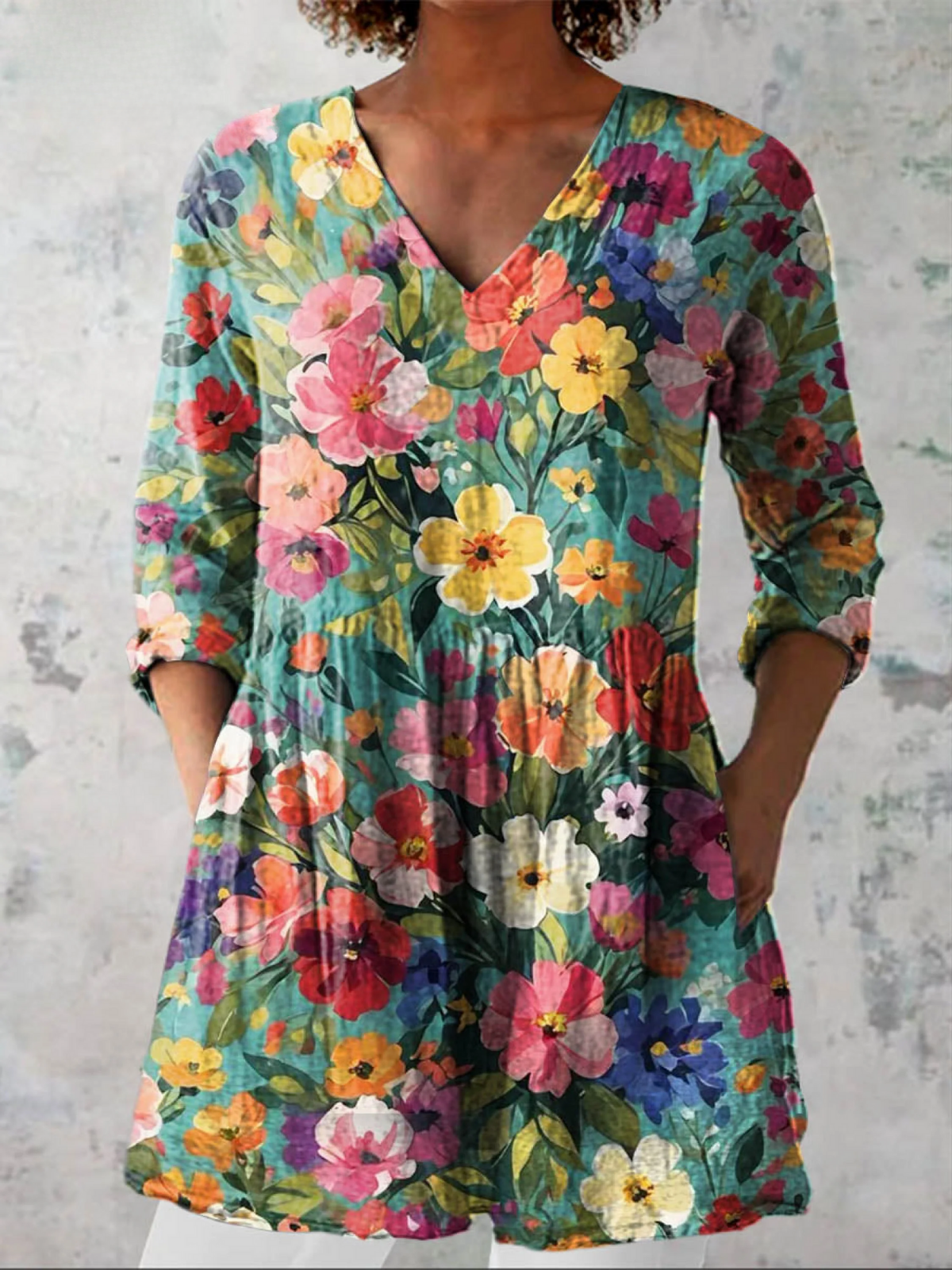 Blusa lunga con scollo a V