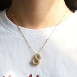 Collana iniziale in lettere a bolle