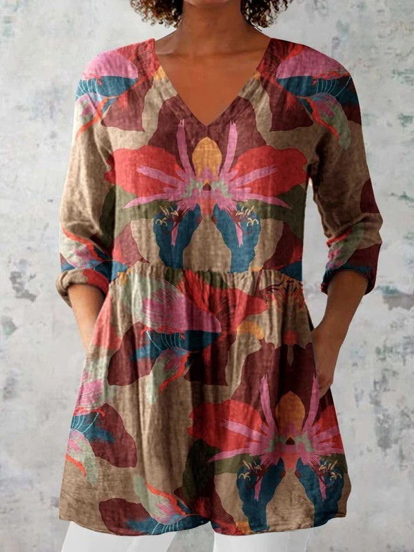 Blusa lunga con scollo a V