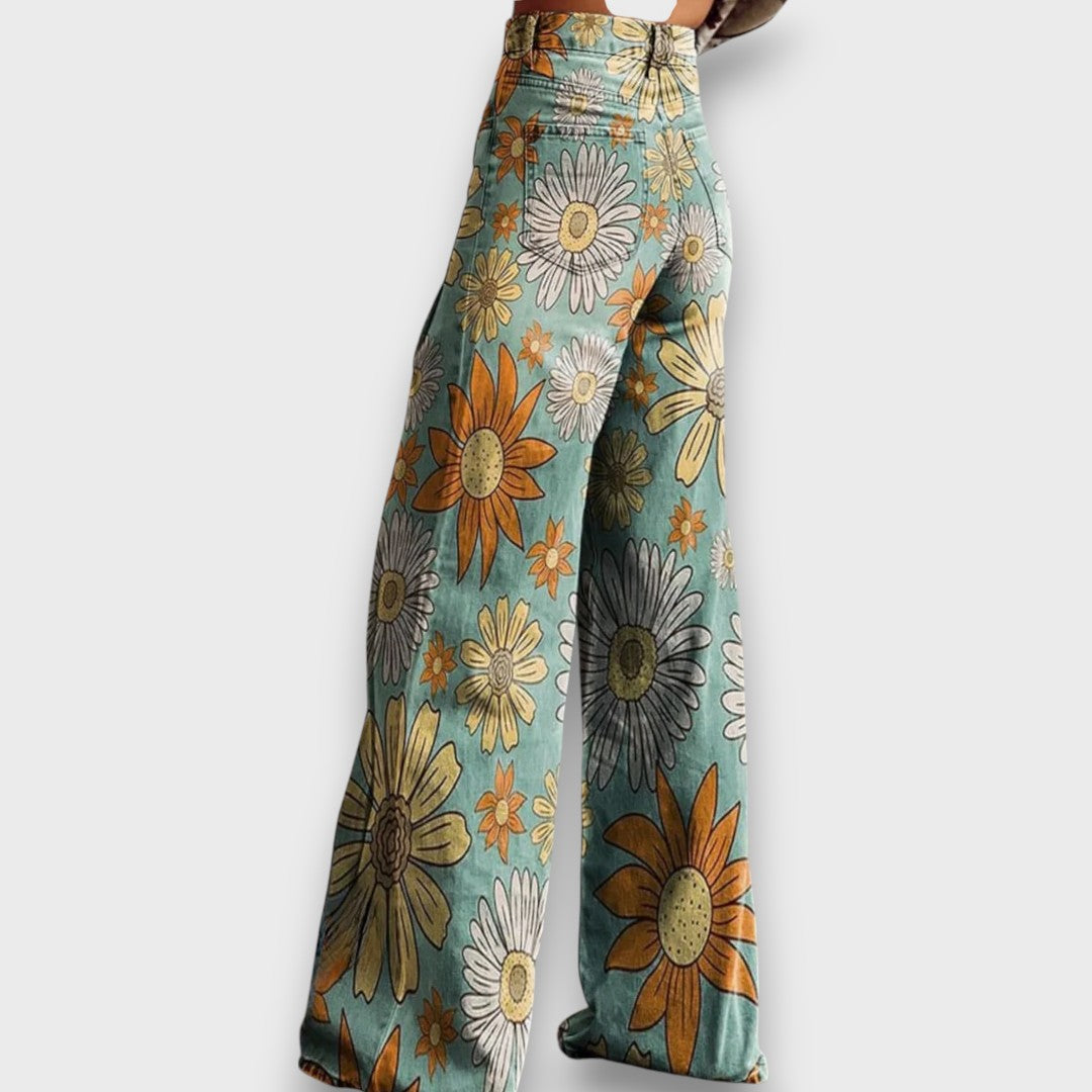 Fiorella – Jeans a gamba larga con stampa floreale retrò