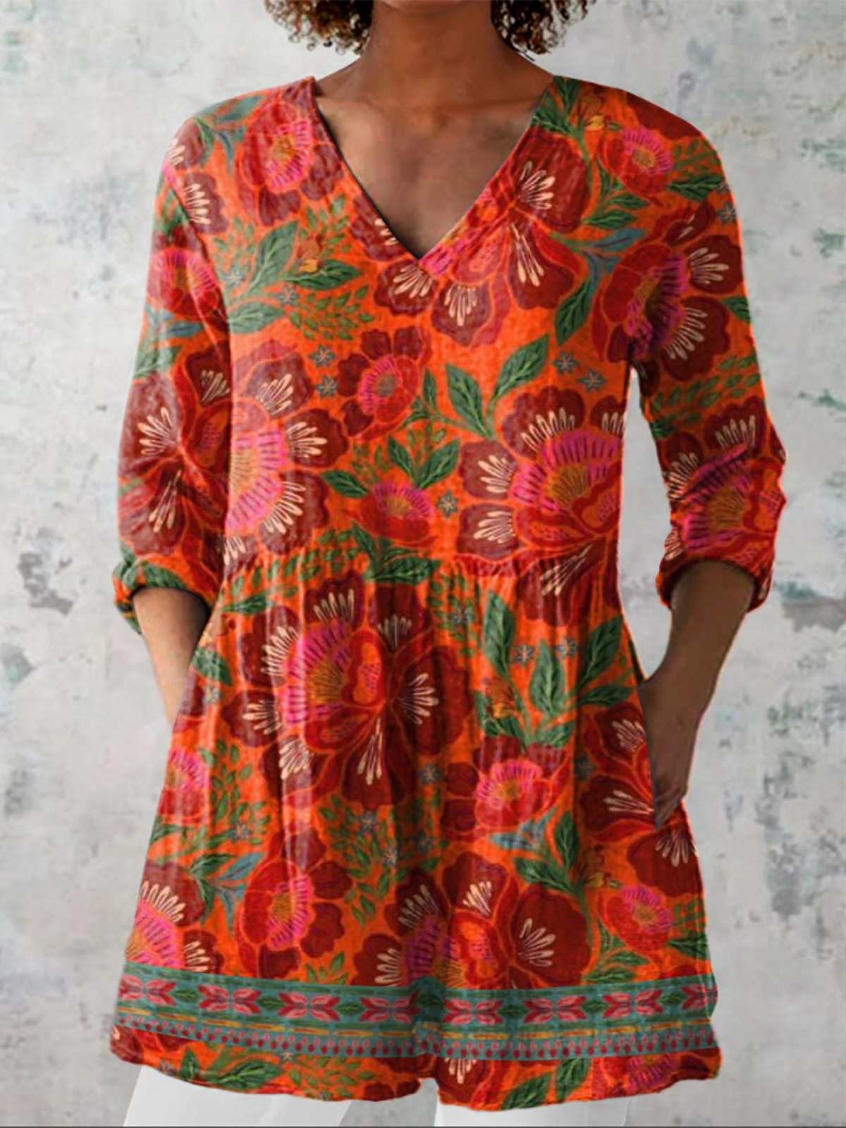 Blusa lunga a V