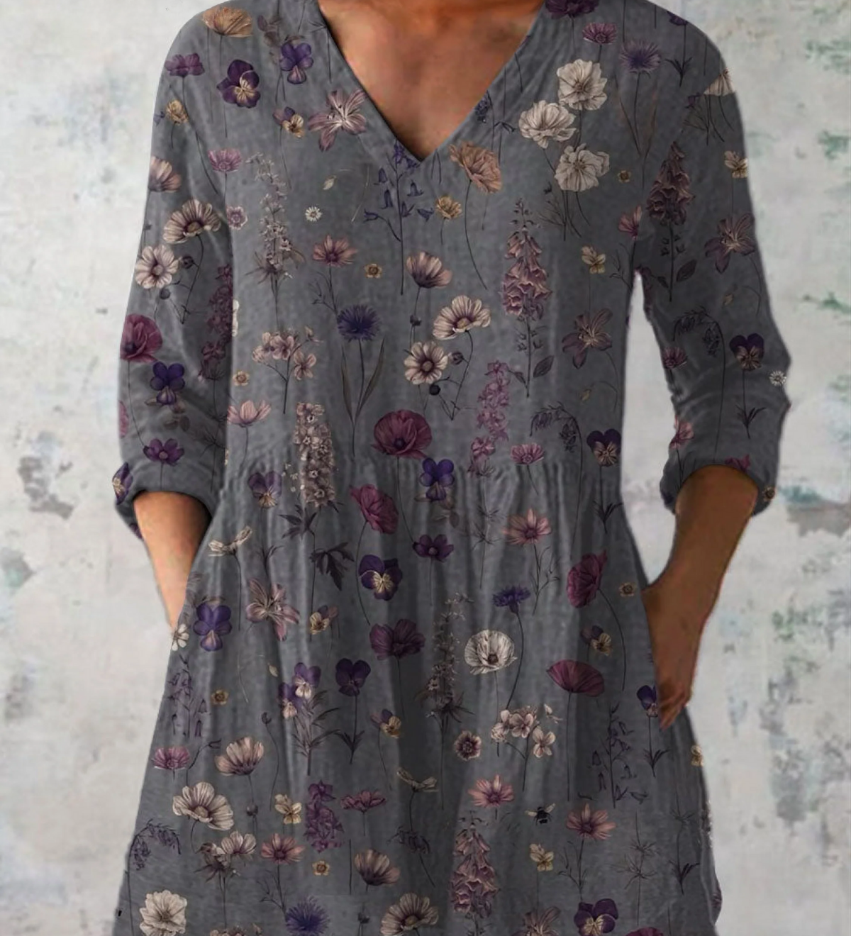Blusa lunga con scollo a V