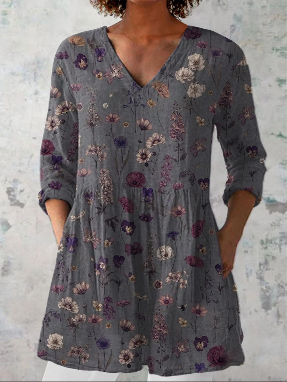 Blusa lunga con scollo a V