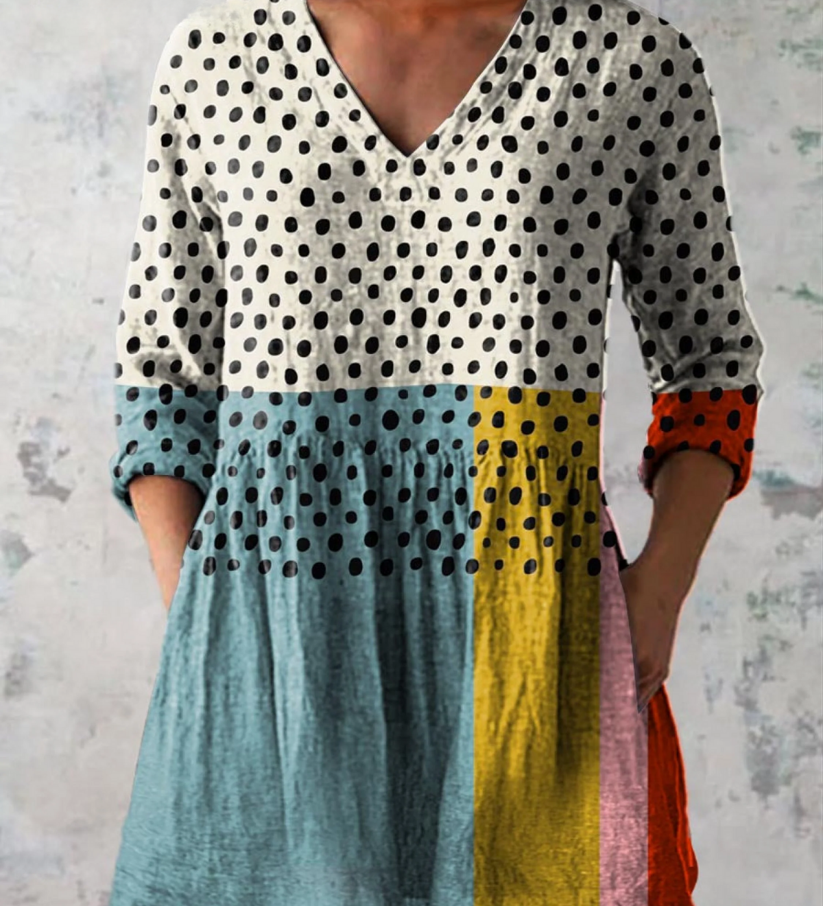 Blusa lunga con scollo a V