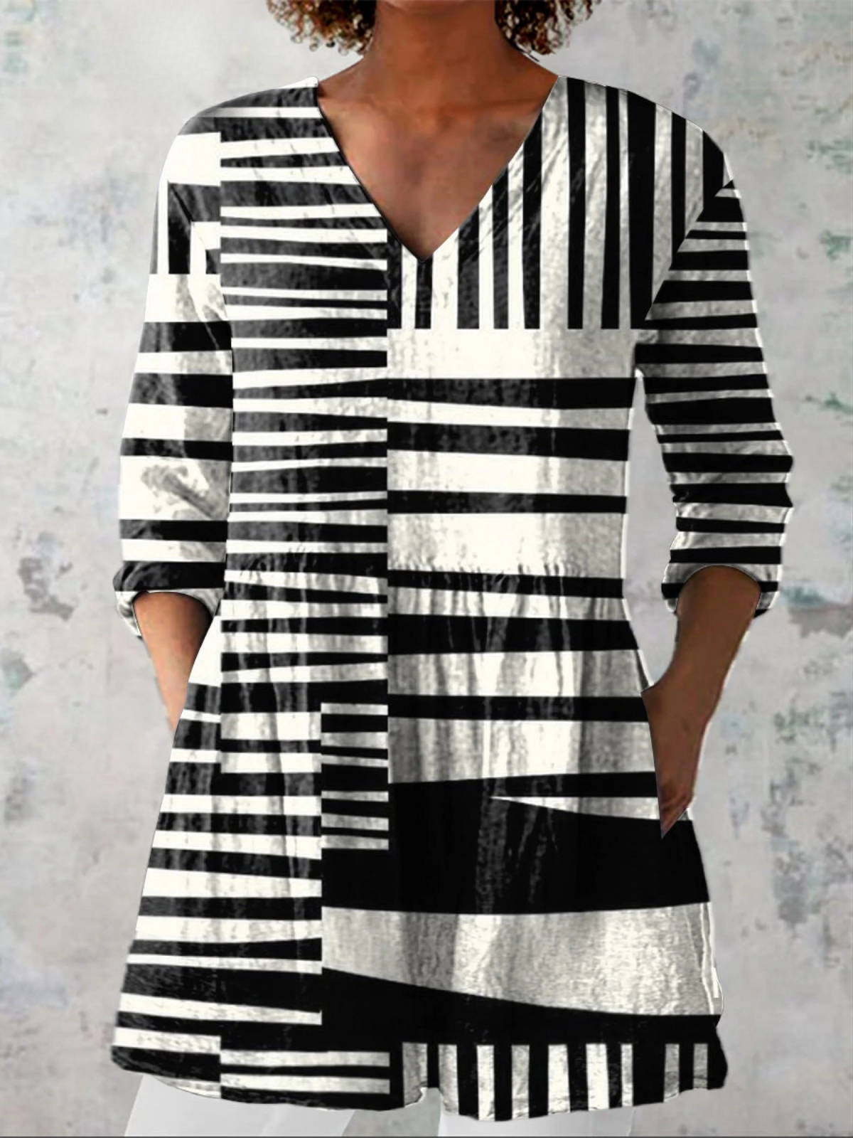 Blusa lunga a V