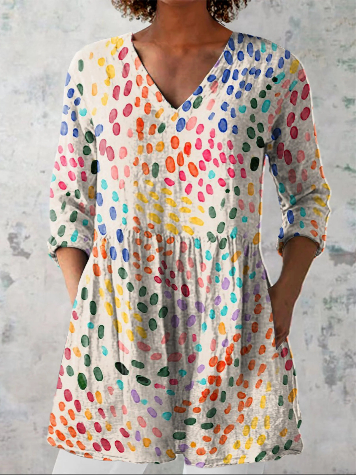 Blusa lunga con scollo a V