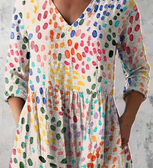 Blusa lunga con scollo a V