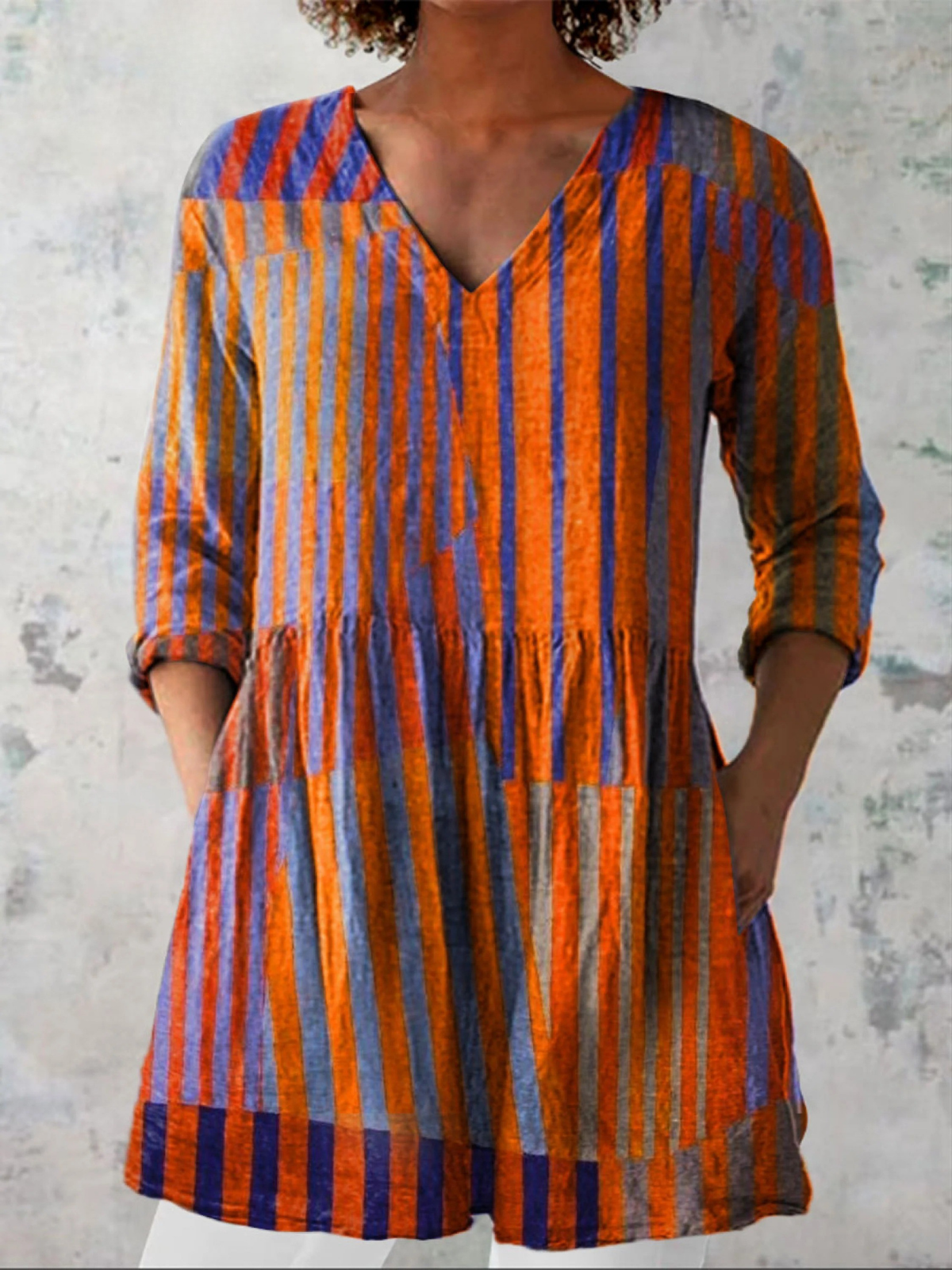 Blusa lunga con scollo a V
