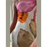 Ismena - Elegante maxi abito floreale con scollo obliquo
