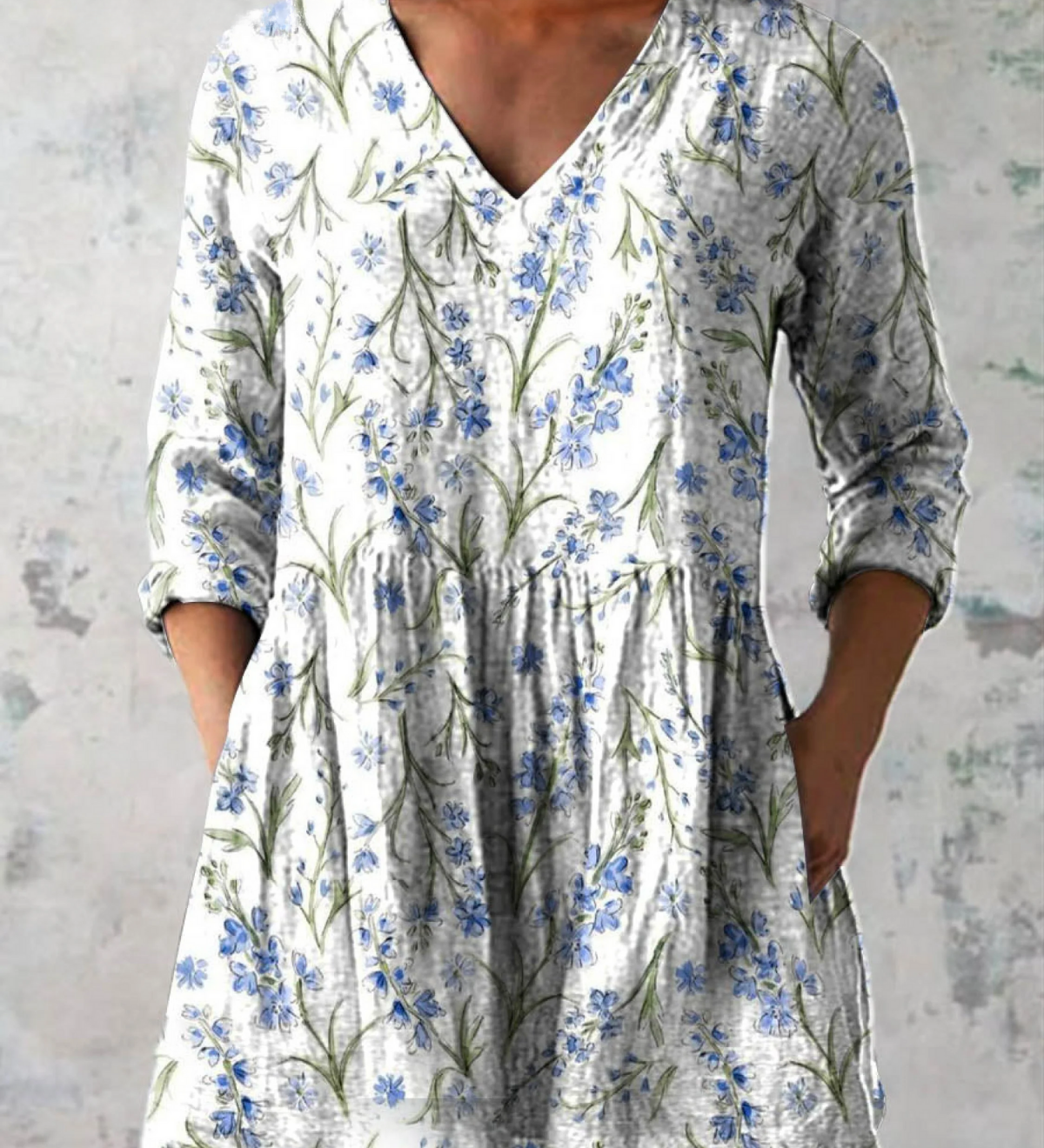 Blusa lunga con scollo a V