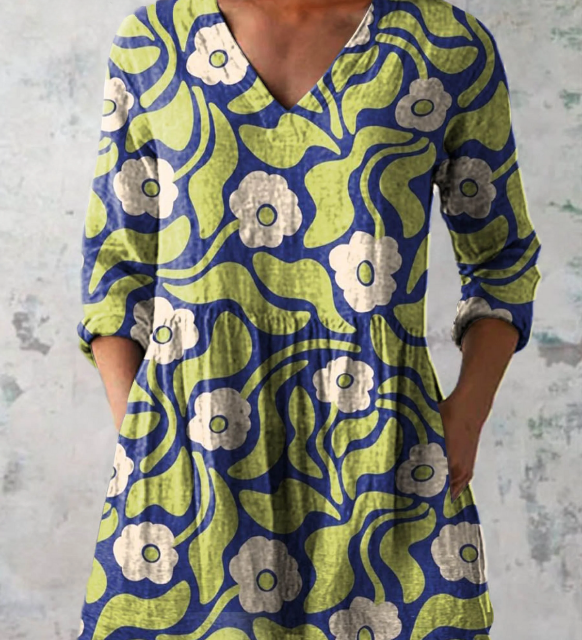 Blusa lunga con scollo a V