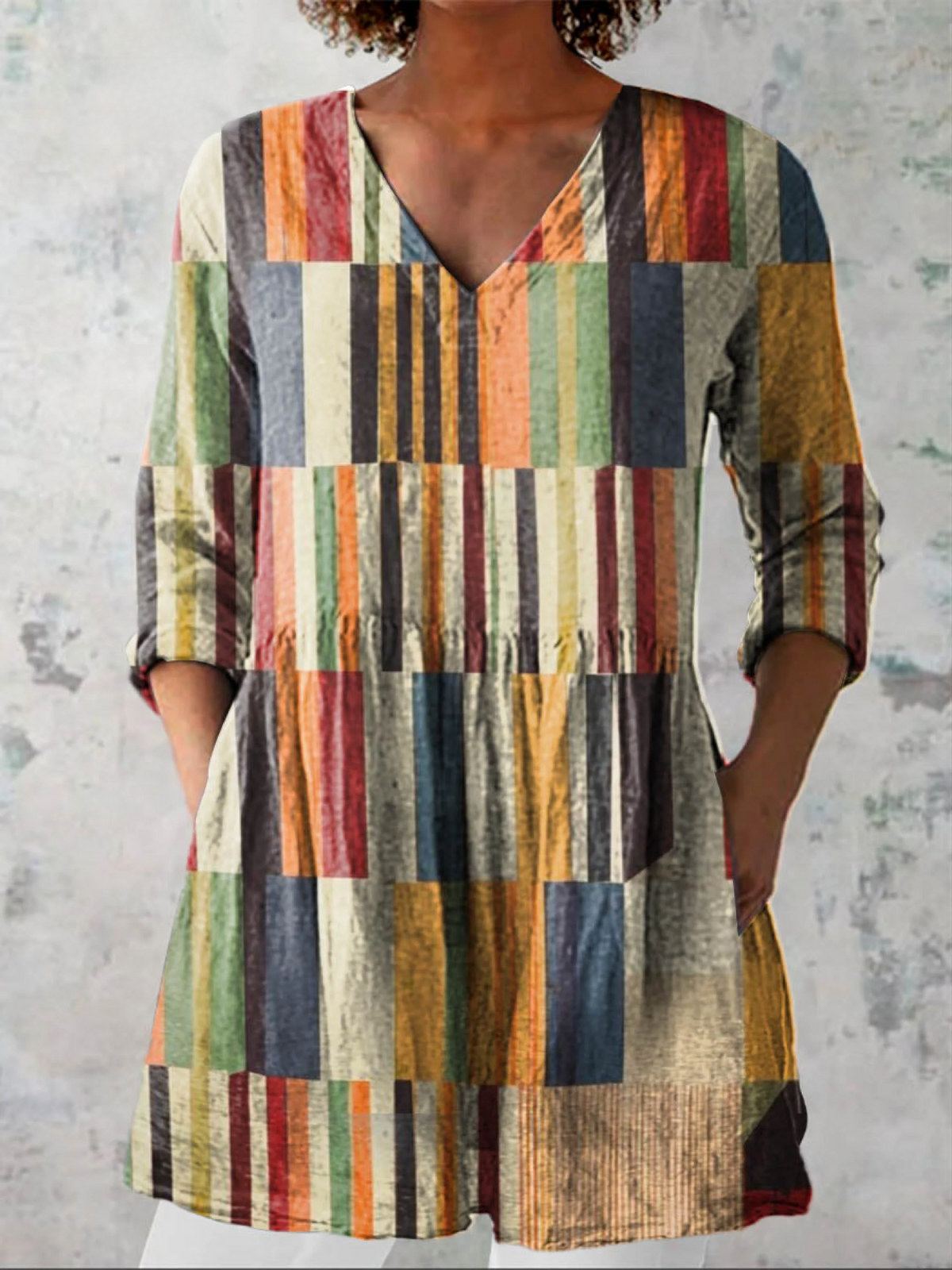 Blusa lunga con scollo a V
