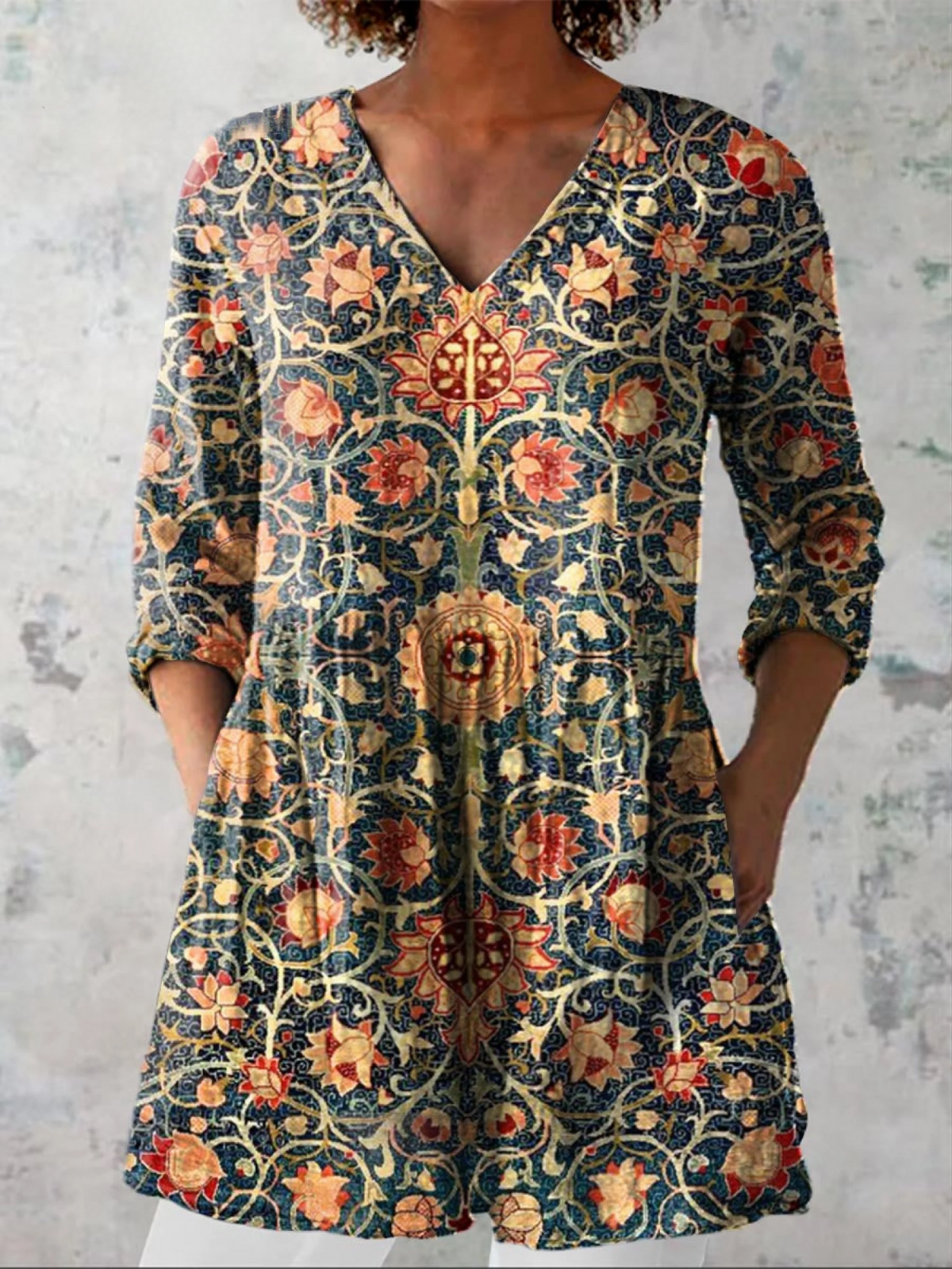 Blusa lunga con scollo a V