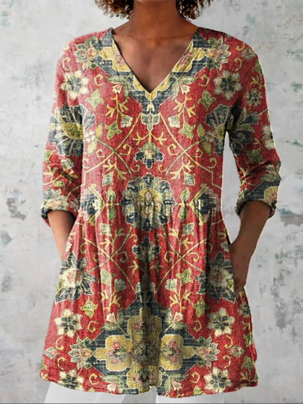 Blusa lunga con scollo a V