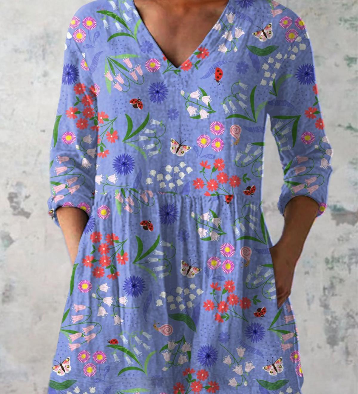 Blusa lunga con scollo a V