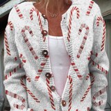 Solange | Cardigan festivo con motivo di bastoncini di zucchero