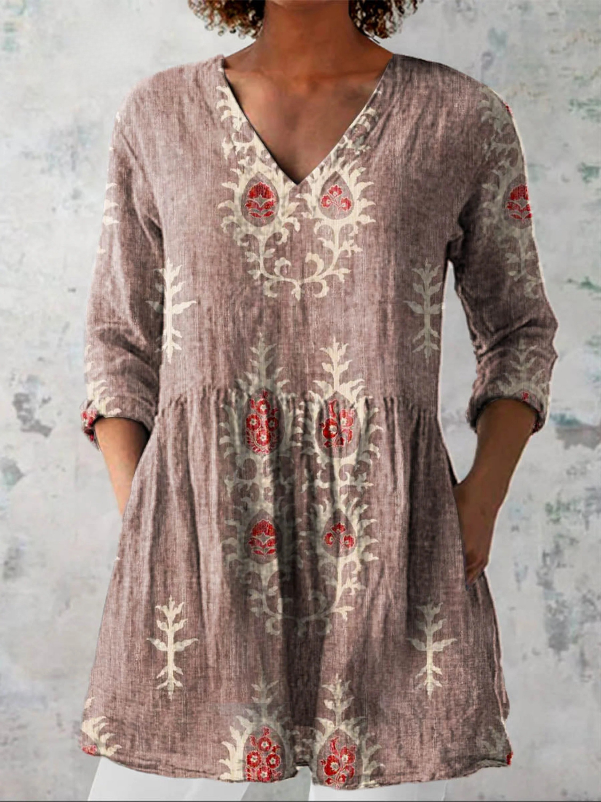 Blusa lunga con scollatura a V