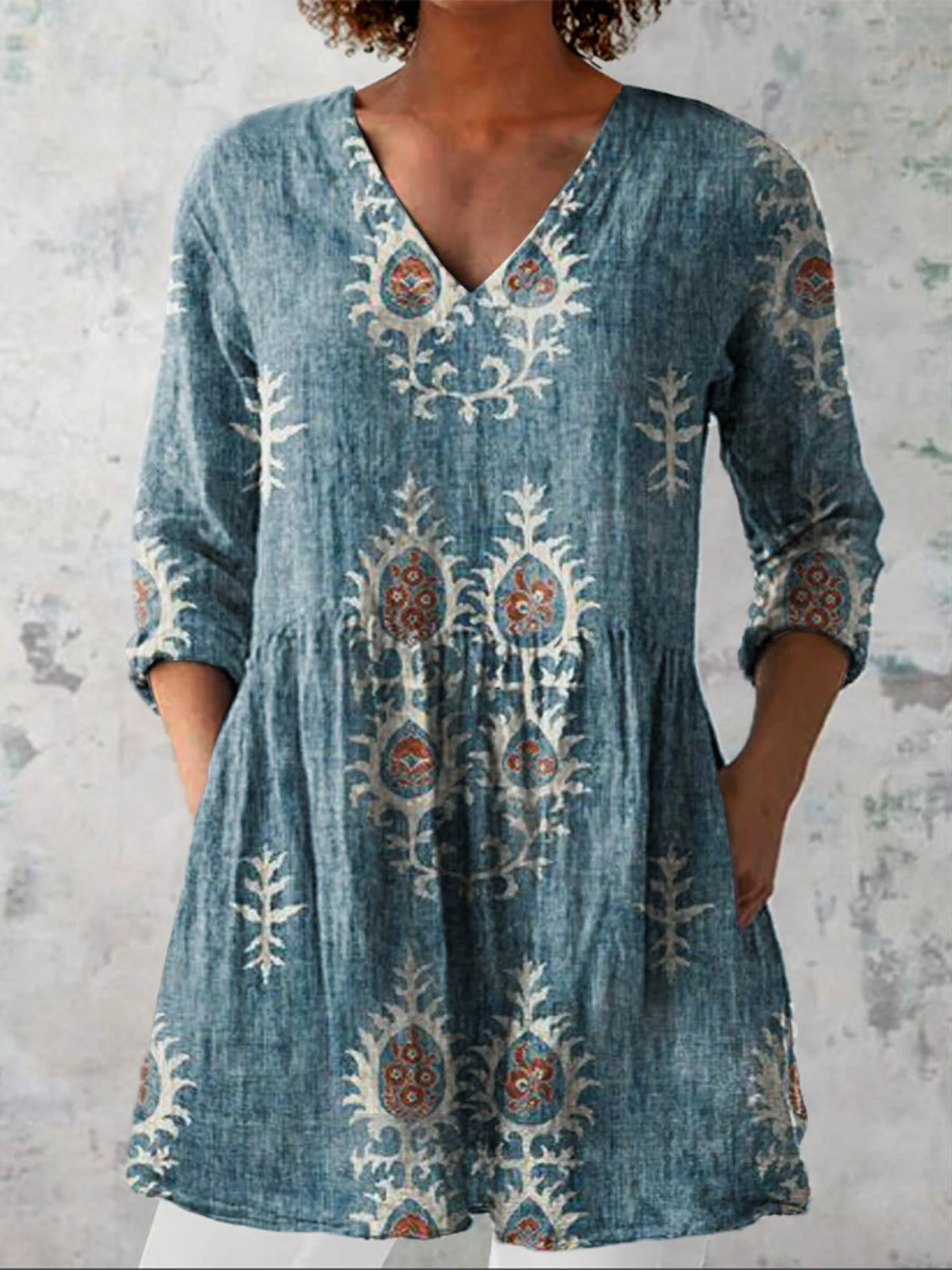 Blusa lunga con scollatura a V