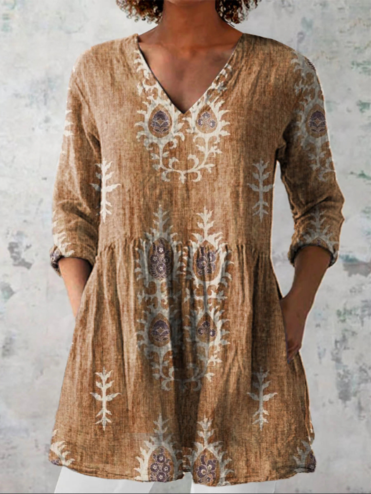 Blusa lunga con scollatura a V