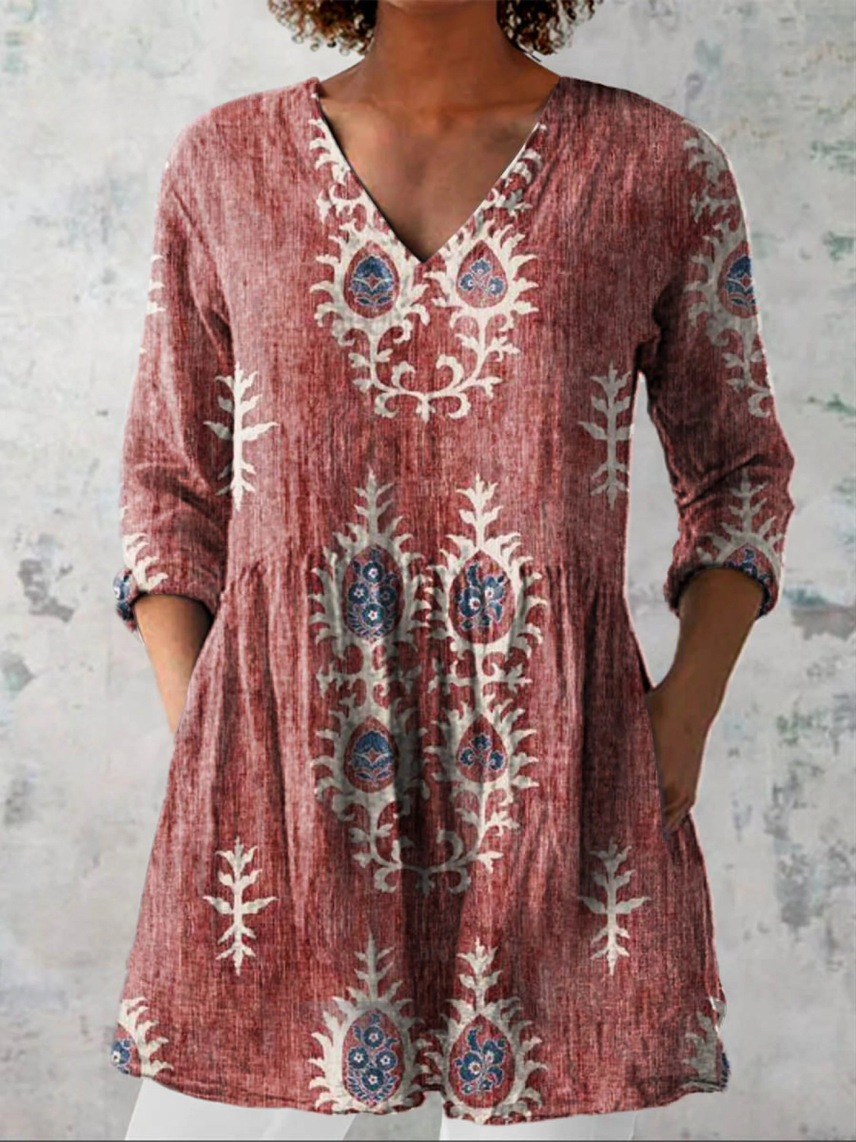 Blusa lunga con scollatura a V