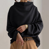 Christine | Top casual con collo alto