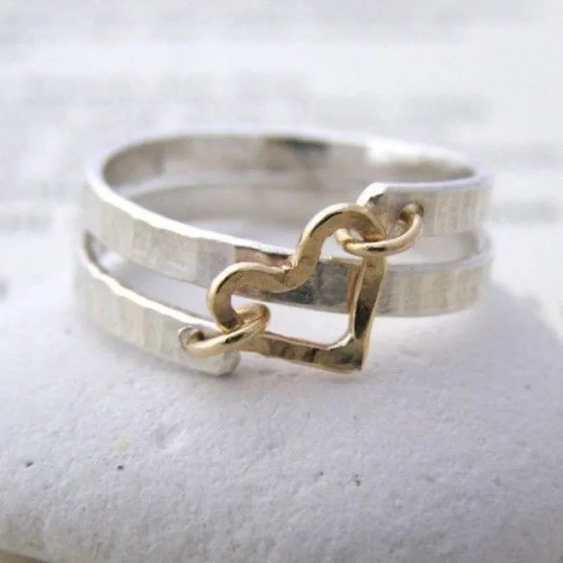  Melania - Anello Cuore Intrecciato
