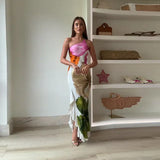 Ismena - Elegante maxi abito floreale con scollo obliquo
