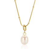 Pauline – Collana dorata con pendente in perla