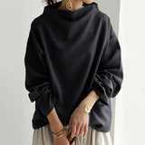Christine | Top casual con collo alto