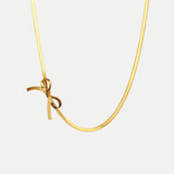 Rébecca – Collana dorata con pendente a forma di iniziale