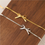 Rébecca – Collana dorata con pendente a forma di iniziale