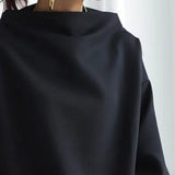 Christine | Top casual con collo alto