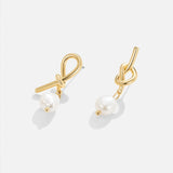 Thérèse-Sophie – Orecchini in argento dalla forma curva