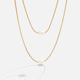 Caroline – Collana d'oro a doppio strato con pietra scura