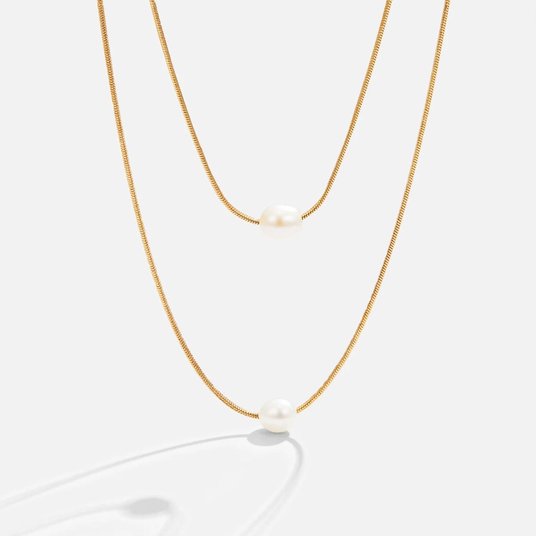 Caroline – Collana d'oro a doppio strato con pietra scura