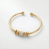 Nina – Bracciale regolabile in oro con charm
